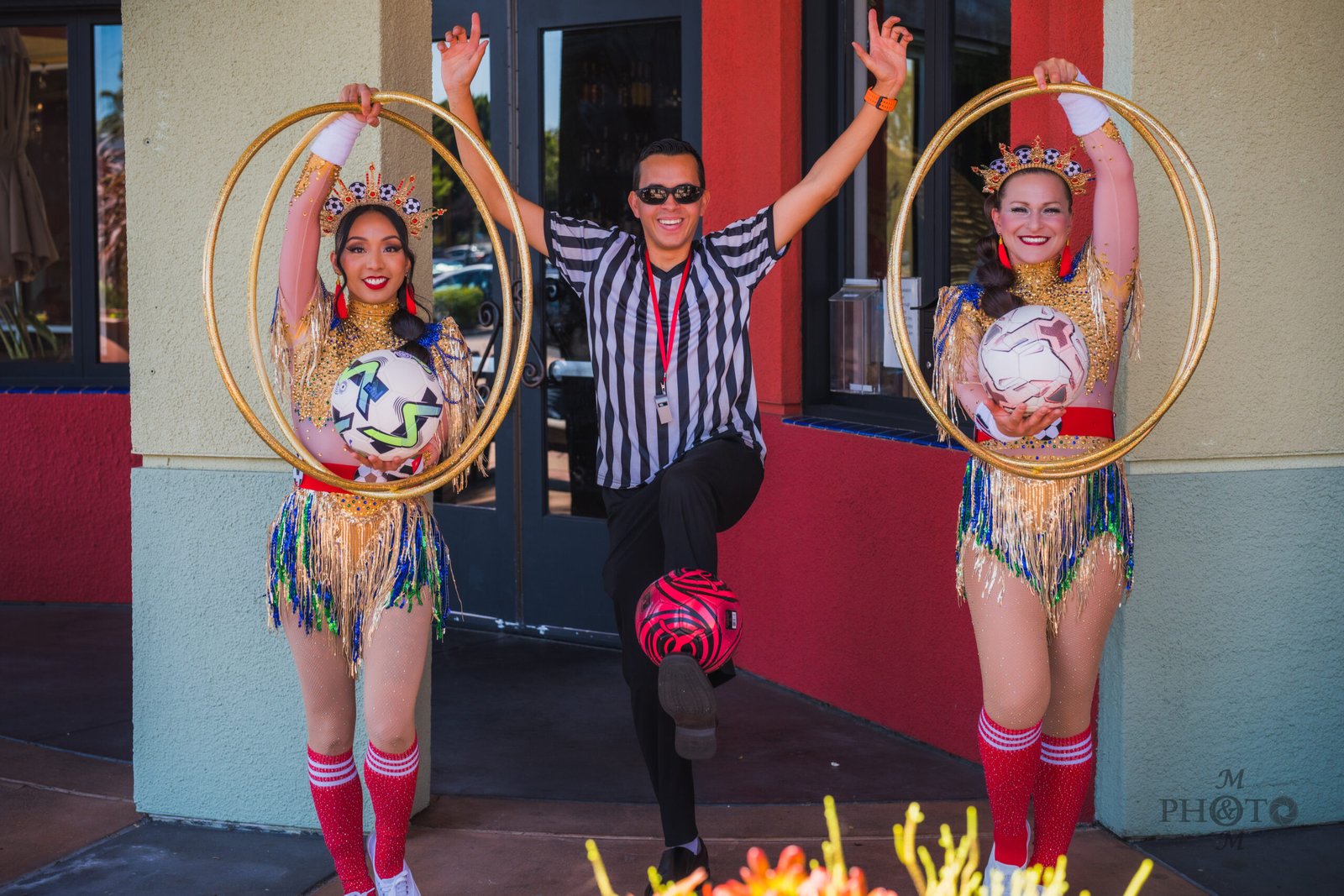 Specialty performers with hula hoops and soccer ball entertaining World Cup VIP guests at Levi's Stadium in Santa Clara